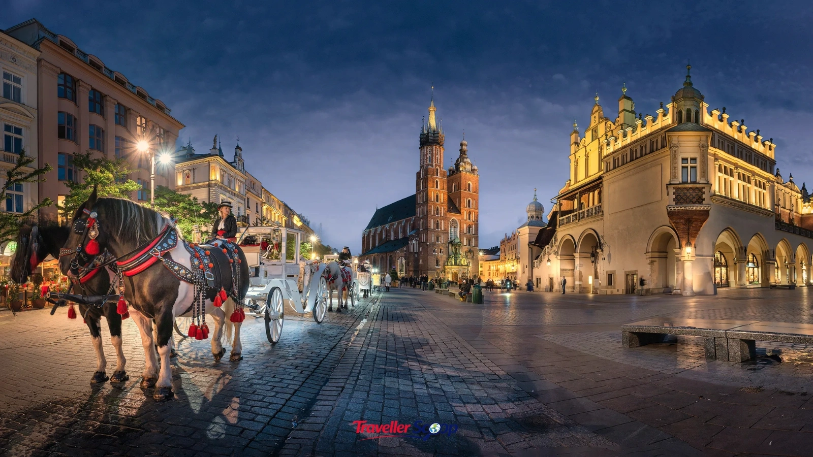 Kraków’s Rynek Główny main market square lit up at night Kraków's Rynek Główny main market square lit up at night