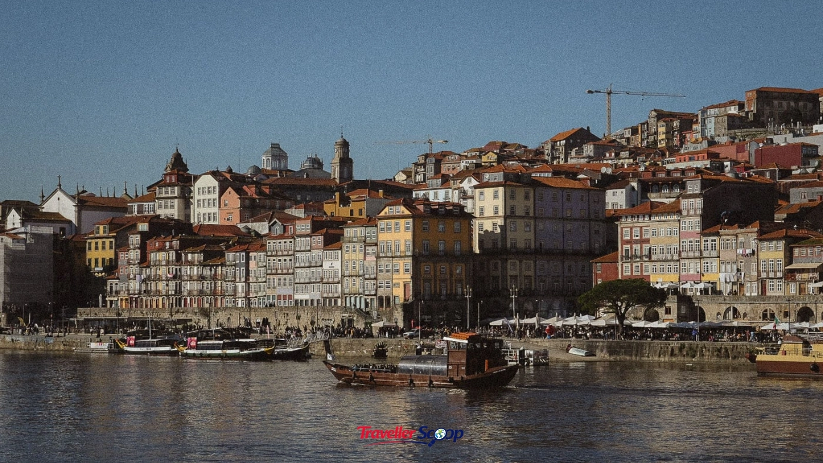 Porto Ribeira waterfront with colorful buildings and Douro river Porto Ribeira waterfront with colorful buildings and Douro river