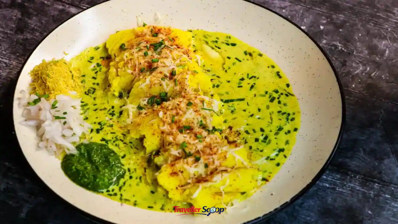 Famous street food in Surat Locho served with butter and sev, a must-try Surat dish