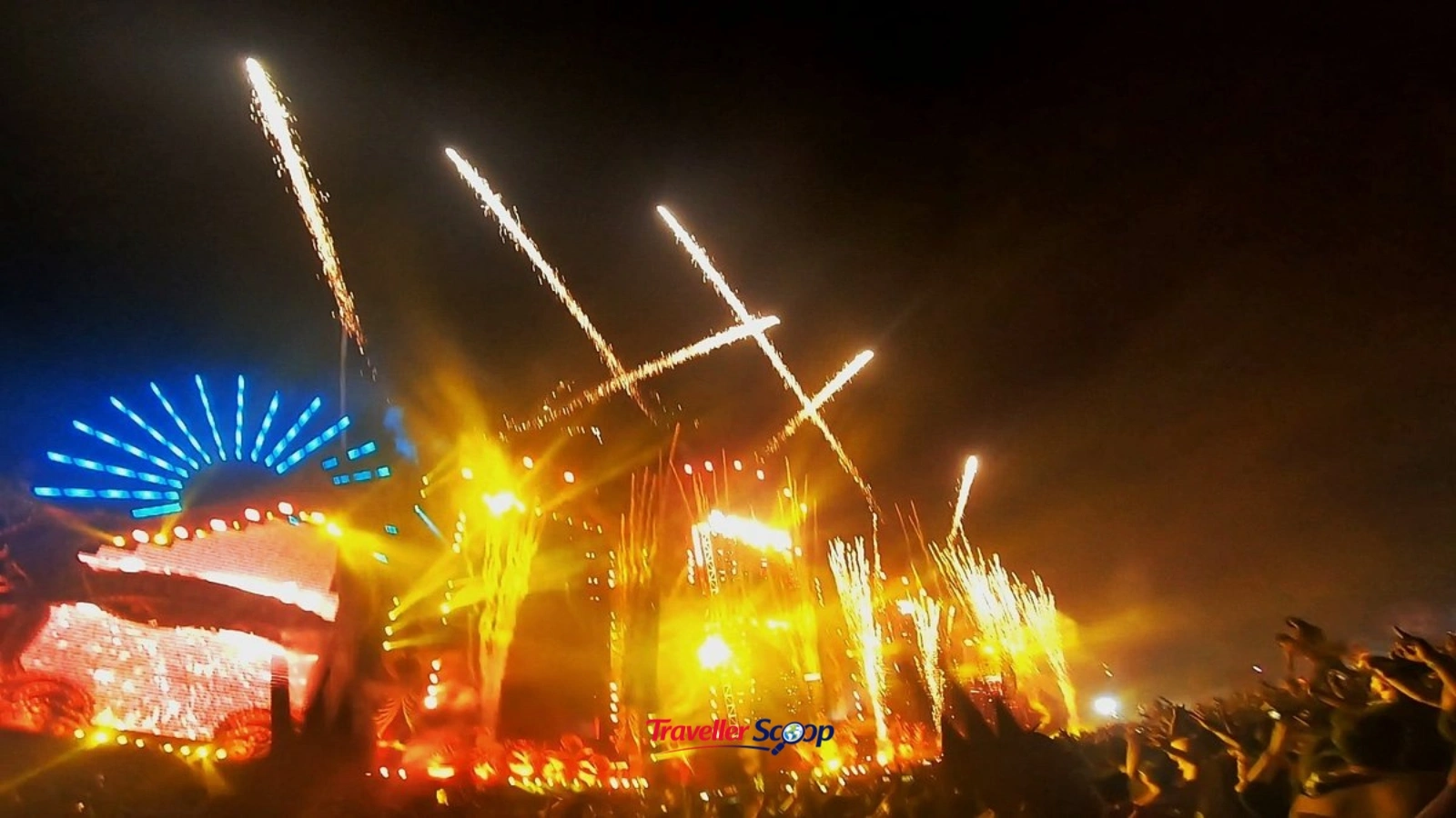 Sunburn EDM festival crowd at Goa beach venue with stage lights Sunburn EDM festival crowd at Goa beach venue with stage lights
