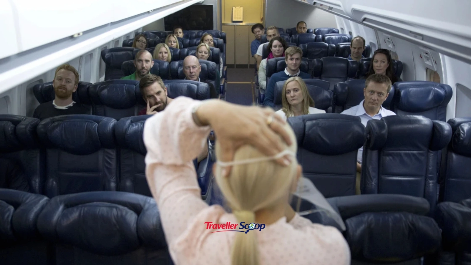 flight attendant etiquette tips for passengers — passenger watching safety demonstration flight attendant etiquette tips for passengers — passenger watching safety demonstration
