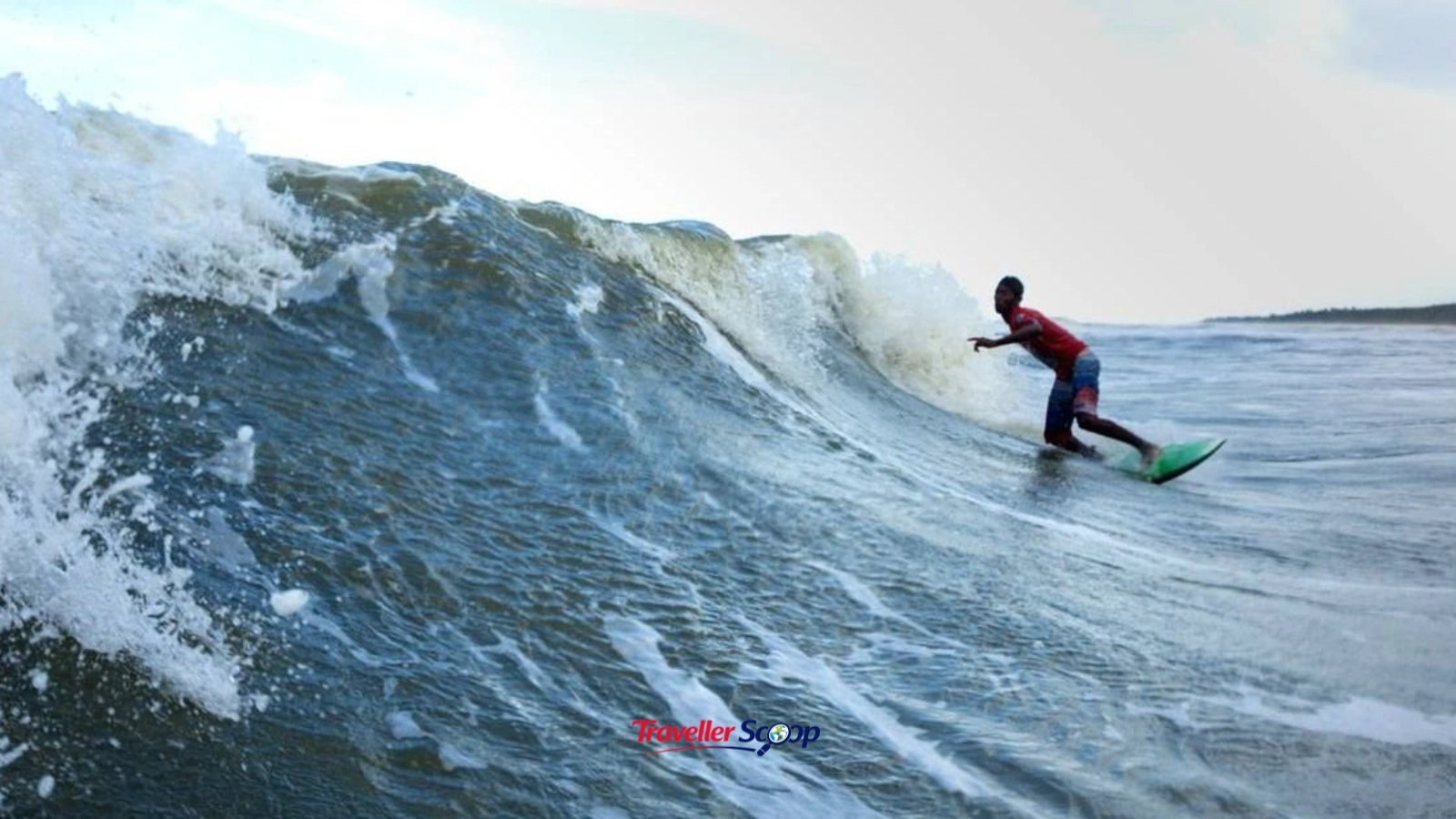 surfer paddling into waves at one of the best places to surf in India