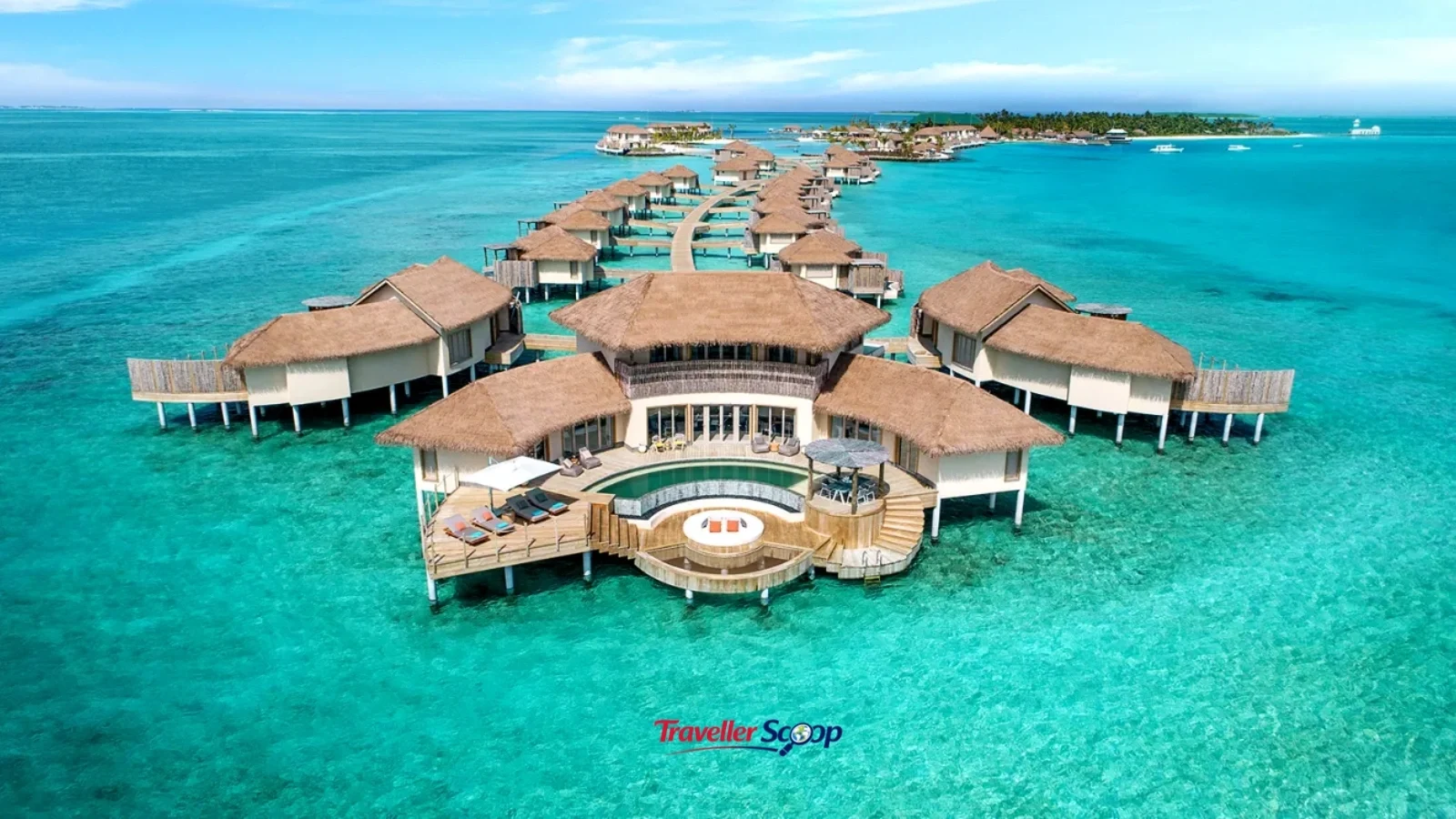 Overwater bungalows in Maldives surrounded by turquoise lagoon water Overwater bungalows in Maldives surrounded by turquoise lagoon water